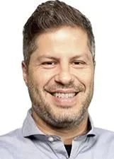 Foto oficial de GUILHERME PUGLIESE nas eleições 2026, divulgada pelo TSE